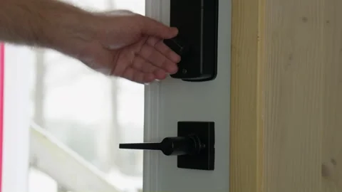 Men hand unlocked and opened a outside door inside view Vídeo Stock 258083191