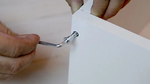 Men hands fastened screw Stock Footage 226786329