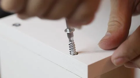 Men hands fastened vertical screw screed 스톡 동영상 228808725