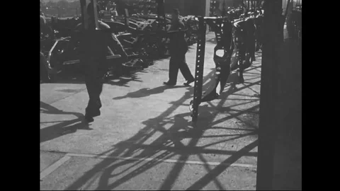Men hang chassis on the production line of automobile factory - 1939 Stock Footage 101983457