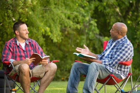 Men having a bible study. Stock Photos