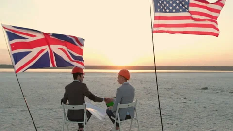 Men in helmets sit on chairs. Stock Footage 137948447