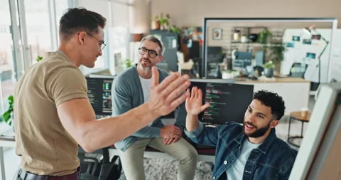 Men, high give and programming in office with computer, success and happy with Stock Footage 290064825