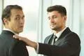 The men hold on the shoulder in the office Photo