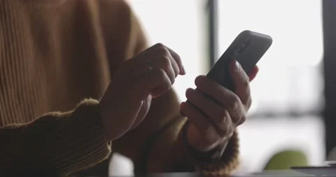 Men holding cellphone in hands, scrolling personal page in social network Stock Footage 166296839