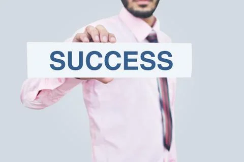 Men holding Success Note Stock Photos