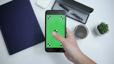 Men Holds The SmartPhone In his Hands,Left Swipe.Green Sreen Chroma key Stock Footage