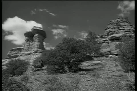 Men on horseback galloping down hill Video stock 11348108