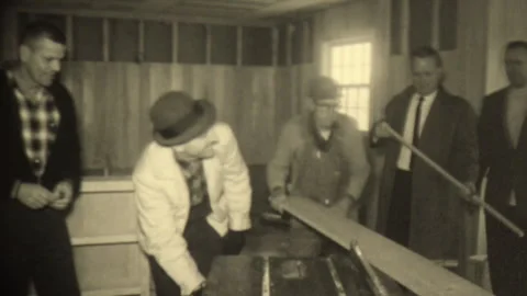 Men In House Review Construction Progress, Show Off Tools And Building Supplies Stock Footage 245397474