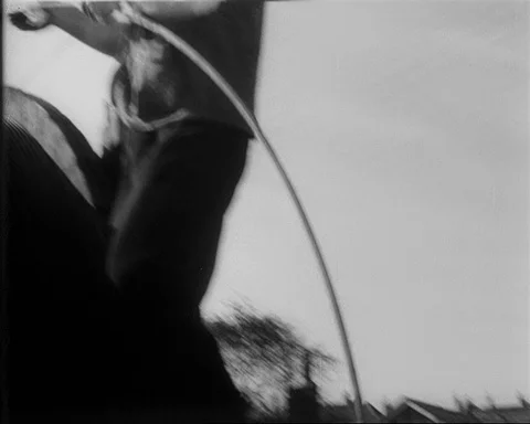 Men installing electric cables over rail track, UK 1957 Stock Footage 132322233