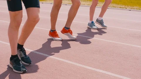 Men jogging on stadium Stock Footage 113464509