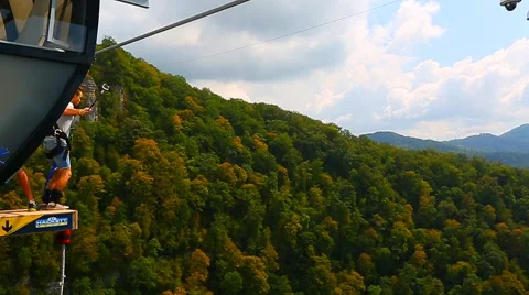 Men jump from the bridge with 207m Stock Footage 44763696