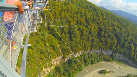 Men jump from the Stock Footage 42863304