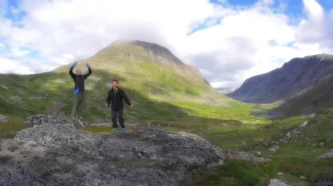 Men Jumping On Mountain Video stock 41962225