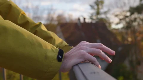 Men leaning against a railing Stock Footage 320556195