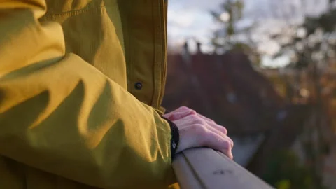 Men leaning against a railing Stock-Footage 320558421