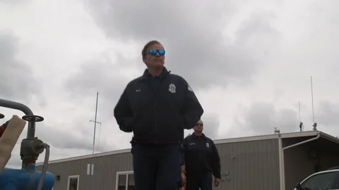 Men leaving the building Stock Footage 116473175