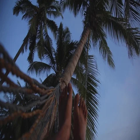 Men Legs Swinging In Hammock On Beach. Stock Footage 69280293