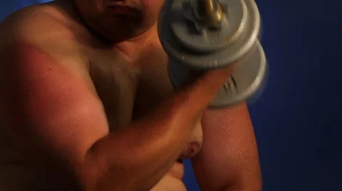 Men lifting dumbbell Stock Footage 8660054