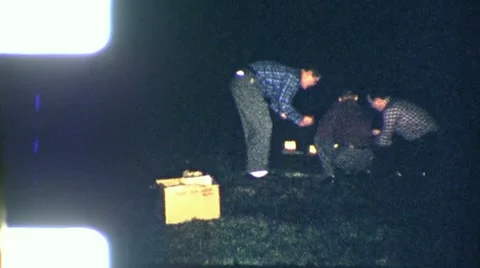 MEN LIGHT4th of July FIREWORKS 1960s Vintage Film Home Movie 3518 Stock Footage