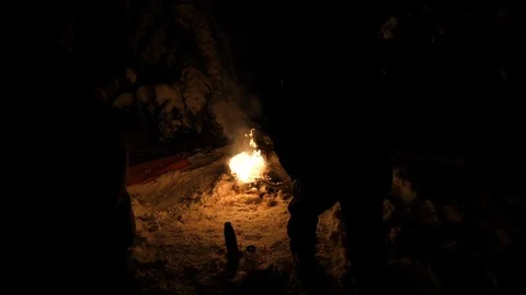 Men lightning with torches firecamp Slow motion bonfire outdoors at the Stock Footage 101047333