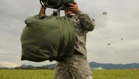 Men Loading up a Parachute (HD)m Stock Footage 11236088