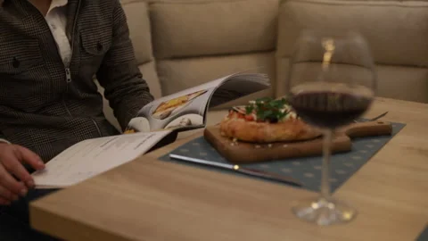 Men looking at Luxury restaurant menu Stock-Footage 170072365