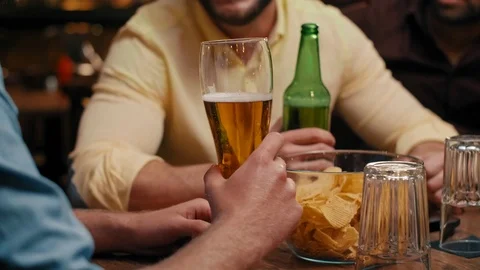 Men making a cheers for good weekend Video stock 108307795