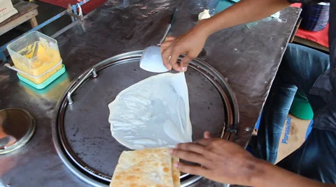 Men making roti. Stock Footage 46723308