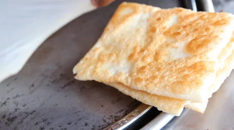 Men making roti Stock Footage 46723320