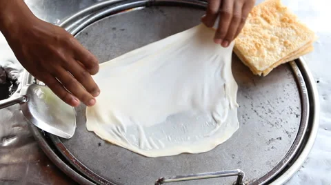 Men making roti Stock Footage 46723536