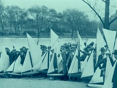 Men With Model Sailboats Waving To Camera - 1920's Stock Footage 41605267