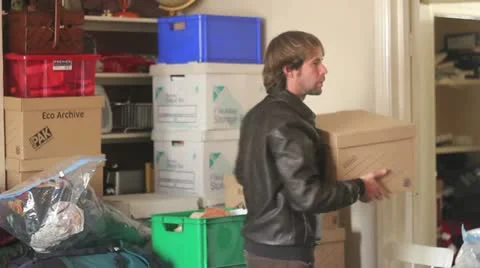 Men moving house Stock Footage 10908272