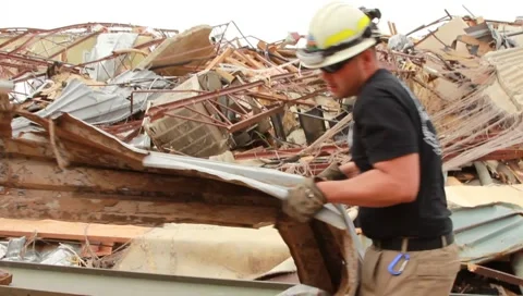 Men Moving Rubble After Tornado (HD)m Stock Footage 5504570