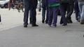 Men moving in the street, tourists walking to railway station, slow-motion HD Footage