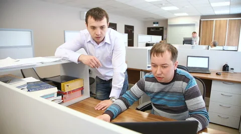 Men in the office near the computer Stock Footage 63086328