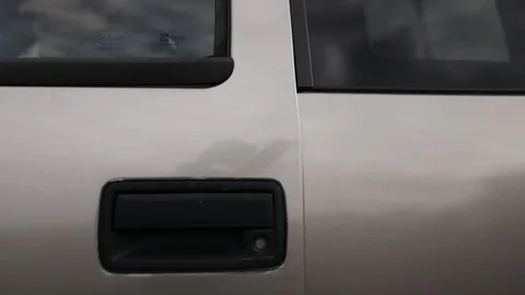 A Men Open the Door of is Car Video stock 97907716