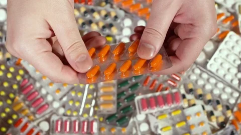 Men opened blister and took a one drug arm. Stock Footage 72906984