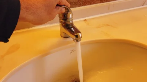 Men opening the faucet Video stock 102621429
