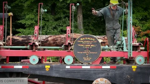Men operating an old-fashioned pony saw mill in Waterloo, Ontario. Stock Footage 12157474