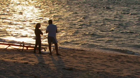 Men or guys at the beach at sunset Video stock 86346