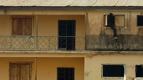 Men Outside an Apartment Complex co Stock Footage 116623369