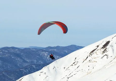 Men paragliding 스톡 사진