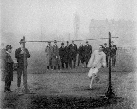Men performing high jump at Cambridge University Sports Day, UK 1903 Video stock 136820514