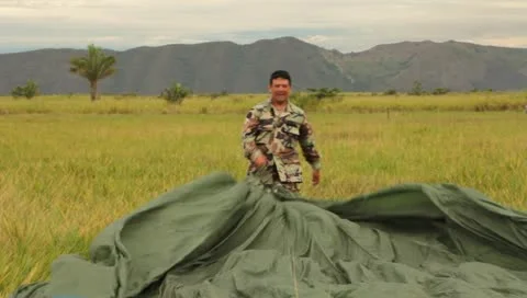 Men picking up a Parachute (HD)m 스톡 동영상 11455226