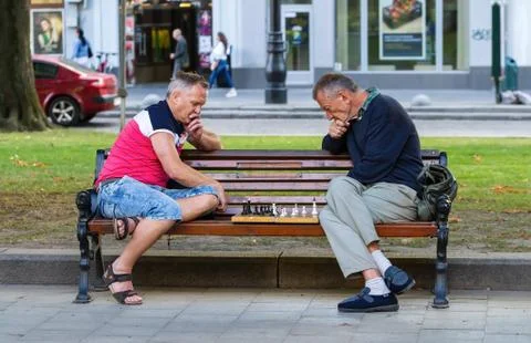 Men play chess. Stock Photos