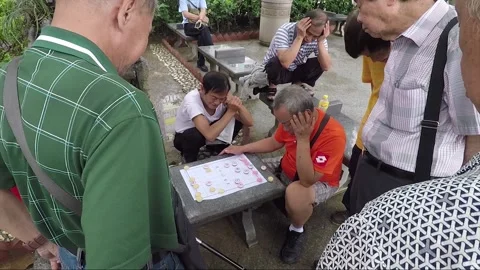 Men Play Chinese Chess, Public Square Rest Street Park, Kowloon, Hong Kong Stock Footage 221136768