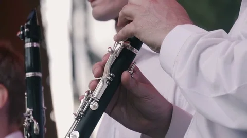 Men play the flute Stock Footage 71756044