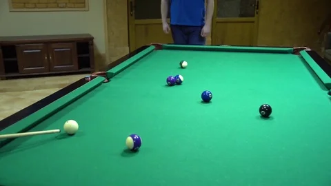 Men play a game of billiards. Stock Footage 73344486