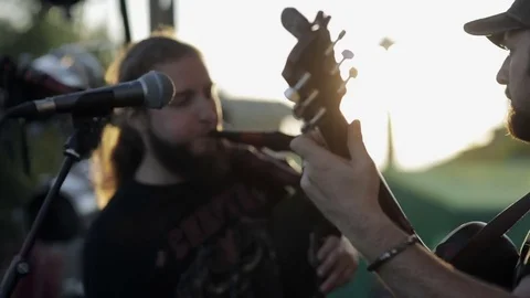 Men play musical instruments Stock Footage 82360188